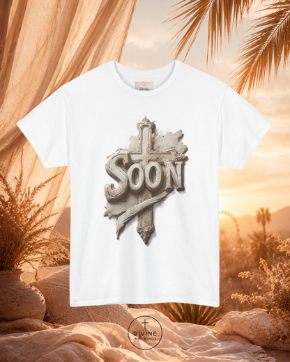 White t-shirt with 'SOON' graphic design against a desert landscape background