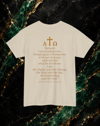 White t-shirt with gold text and symbols on a dark marble background