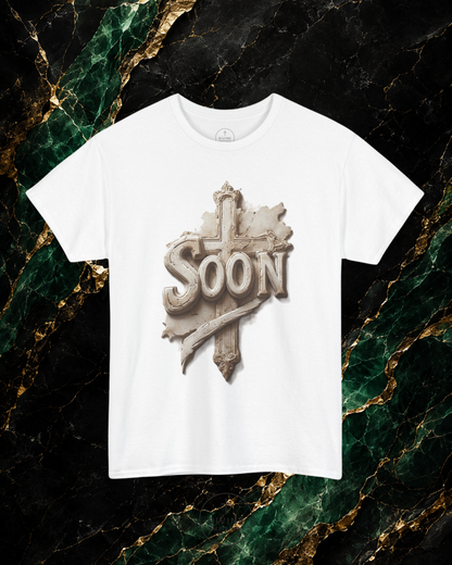 White t-shirt with 'SOON' graphic design on a marble background