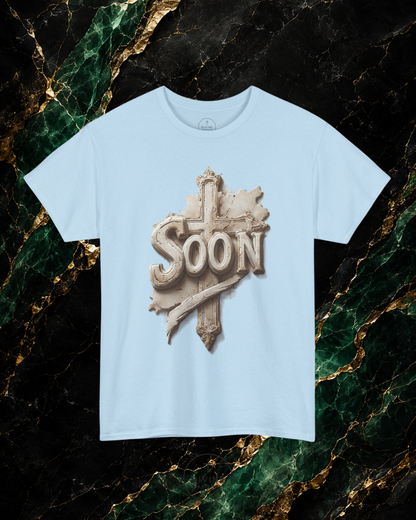 Light blue t-shirt with 'Soon' graphic design on a marble background