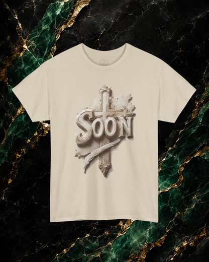 Beige t-shirt with 'Soon' graphic design on a marble background