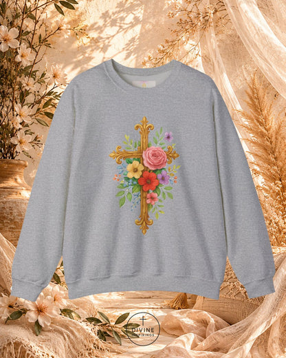 Gray sweatshirt with floral cross design on a decorative background