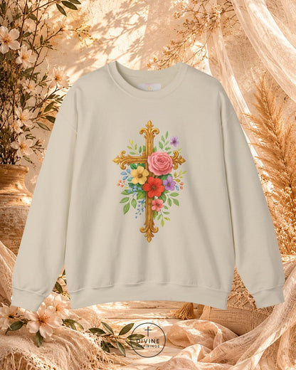 Beige sweatshirt with floral cross design on a decorative background