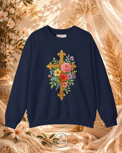 Navy blue sweatshirt with floral cross design on a decorative background