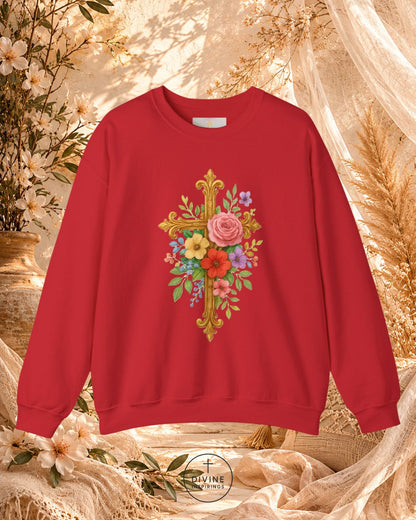 Red sweatshirt with floral and cross design on a decorative background