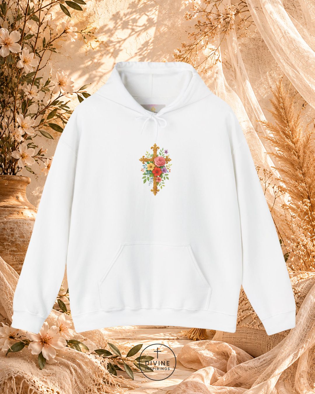 White hoodie with floral design on a decorative background