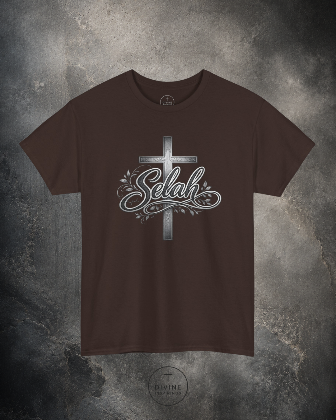 Brown t-shirt with a cross and 'Selah' design on a textured gray background