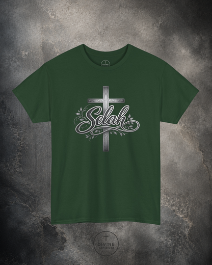 Green t-shirt with a cross and 'Selah' design on a textured gray background