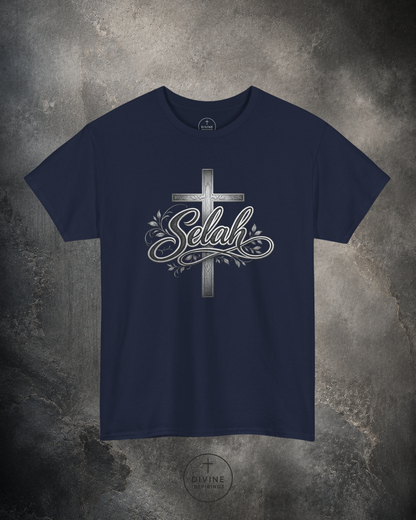 Navy blue t-shirt with a cross and 'Selah' design on a textured gray background
