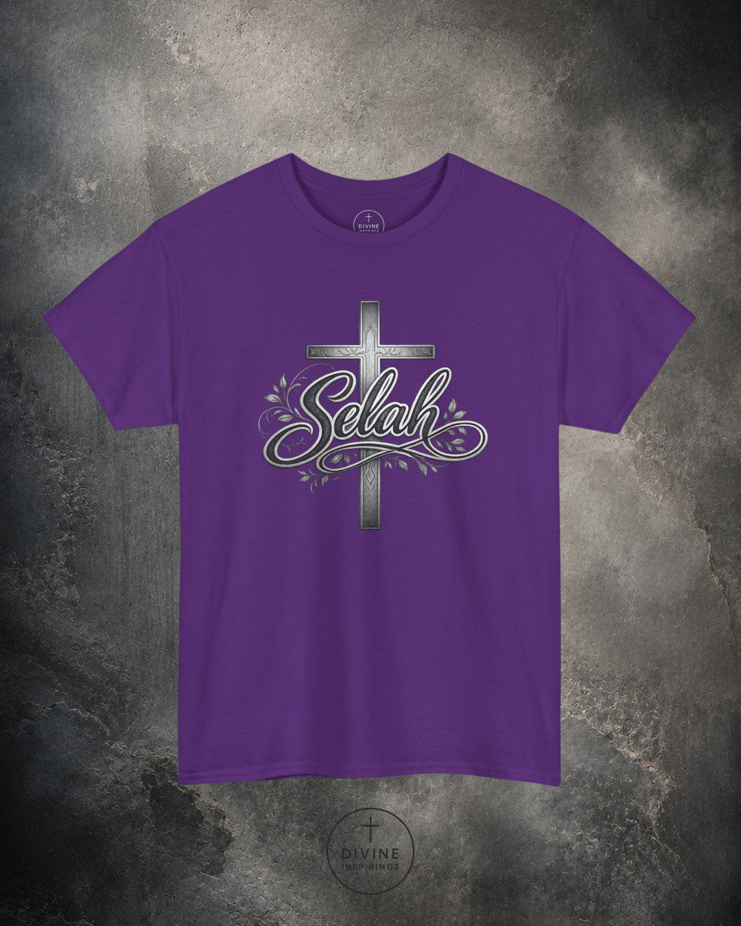 Purple t-shirt with a cross and 'Selah' text on a textured gray background