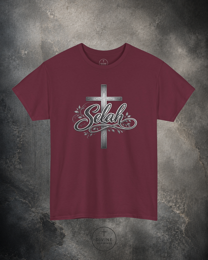 Maroon t-shirt with a cross and 'Selah' design on a textured gray background