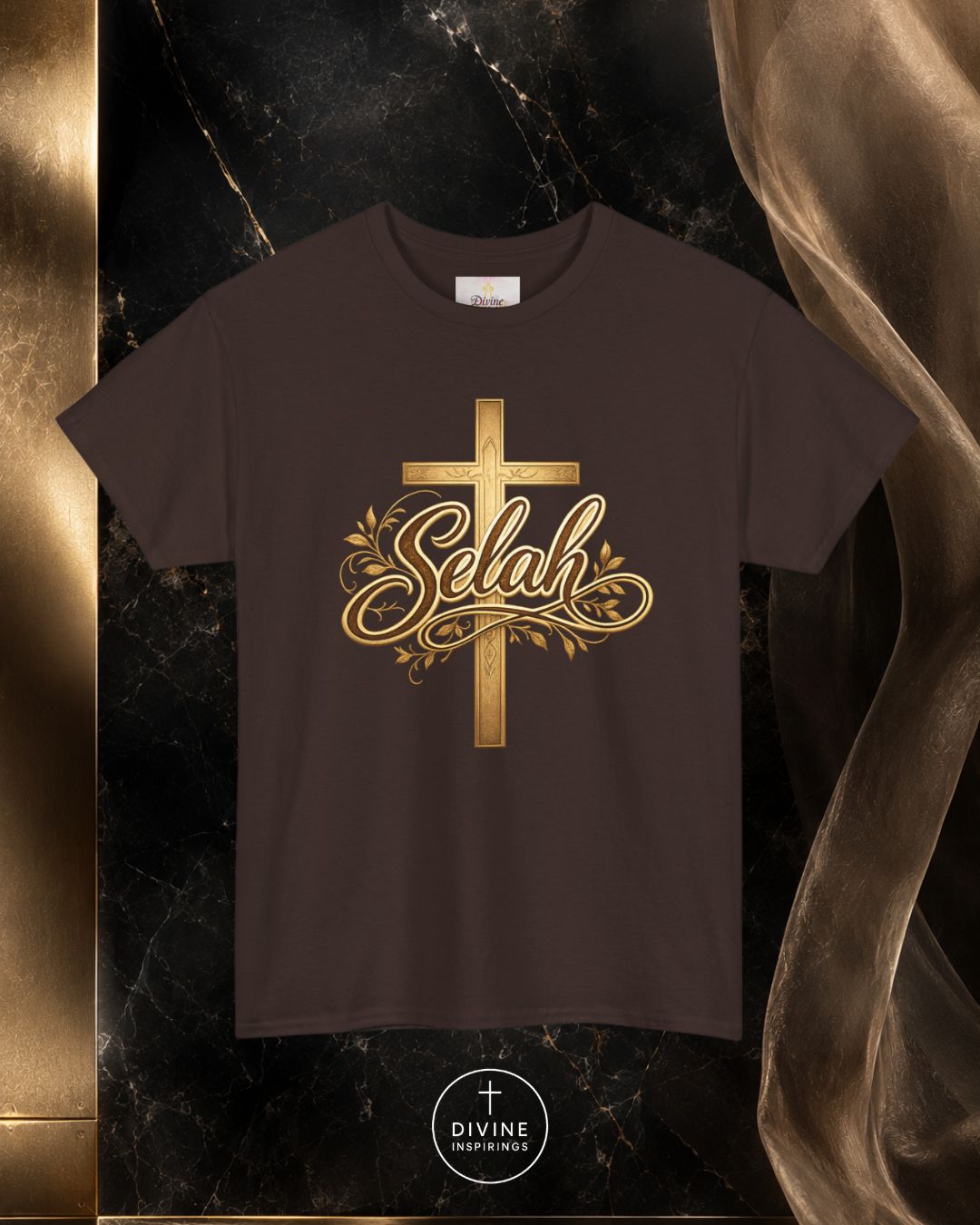 Brown t-shirt with gold cross and 'Selah' design on a dark marble background