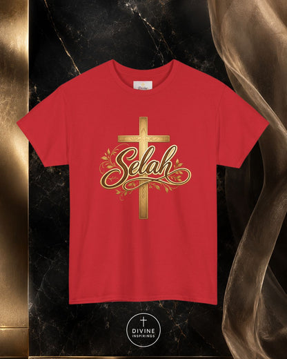 Red t-shirt with gold cross and 'Selah' text on a dark marble background