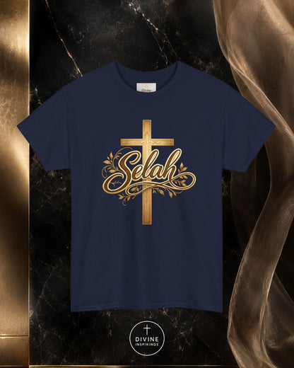 Navy blue t-shirt with gold cross and 'Selah' design on a dark marble background