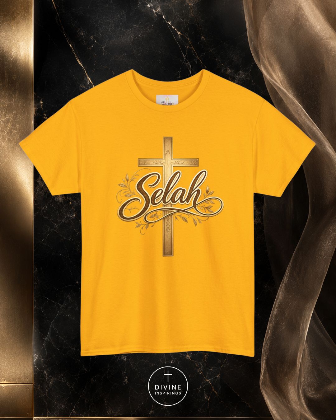 Yellow t-shirt with 'Selah' design on a dark marble background