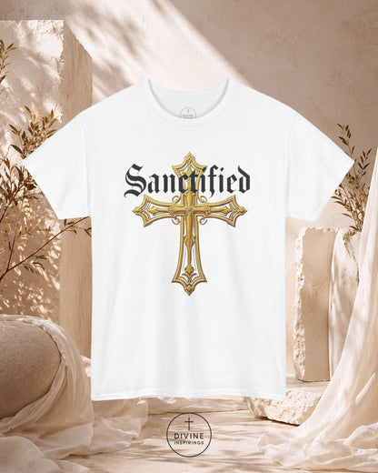 White t-shirt with a gold cross and 'Sanctified' text on a neutral background