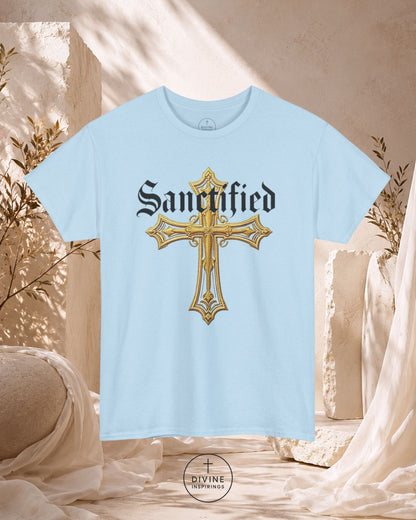 Light blue t-shirt with a gold cross and 'Sanctified' text on a neutral background