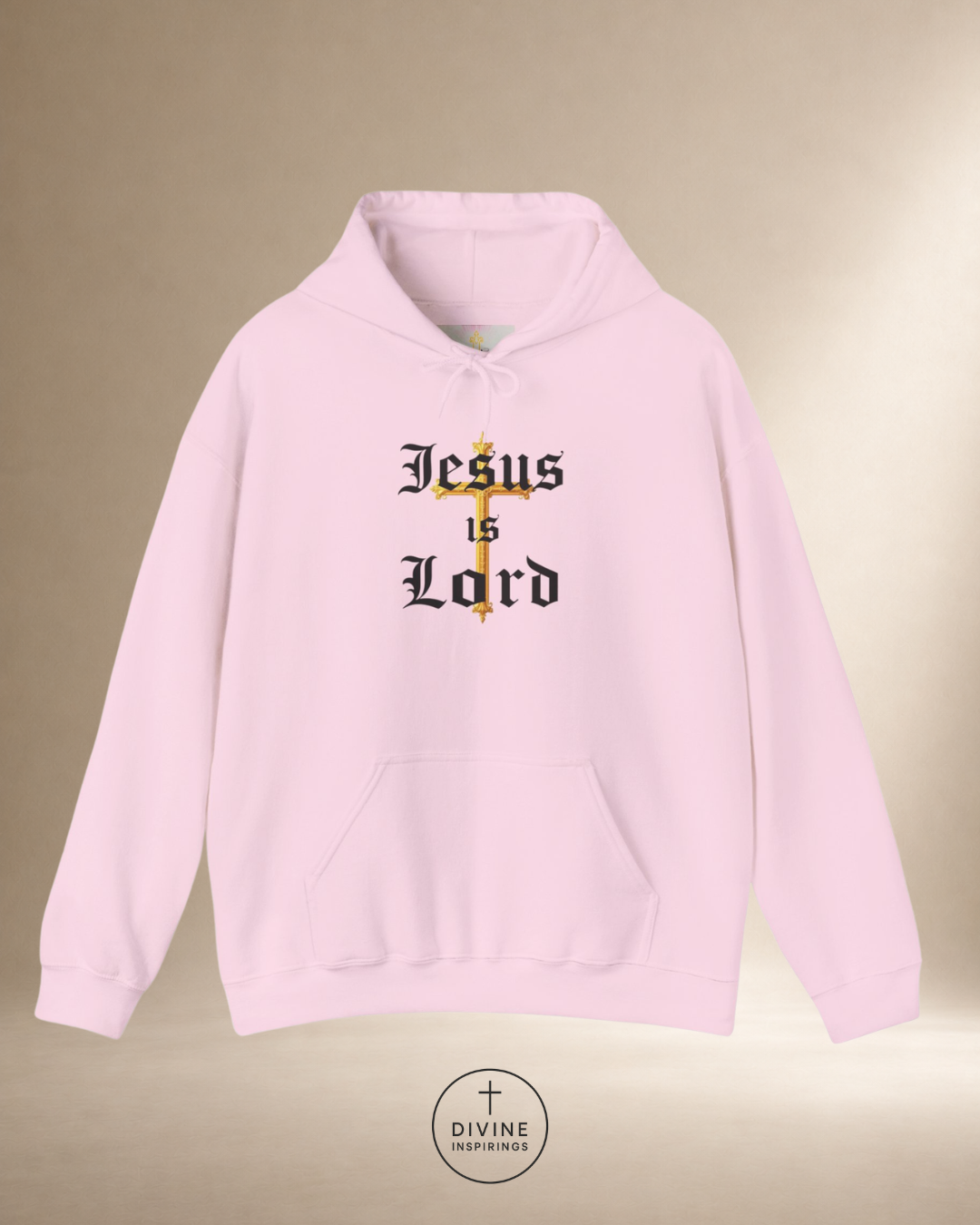 Pink hoodie with 'Jesus is Lord' text on a beige background