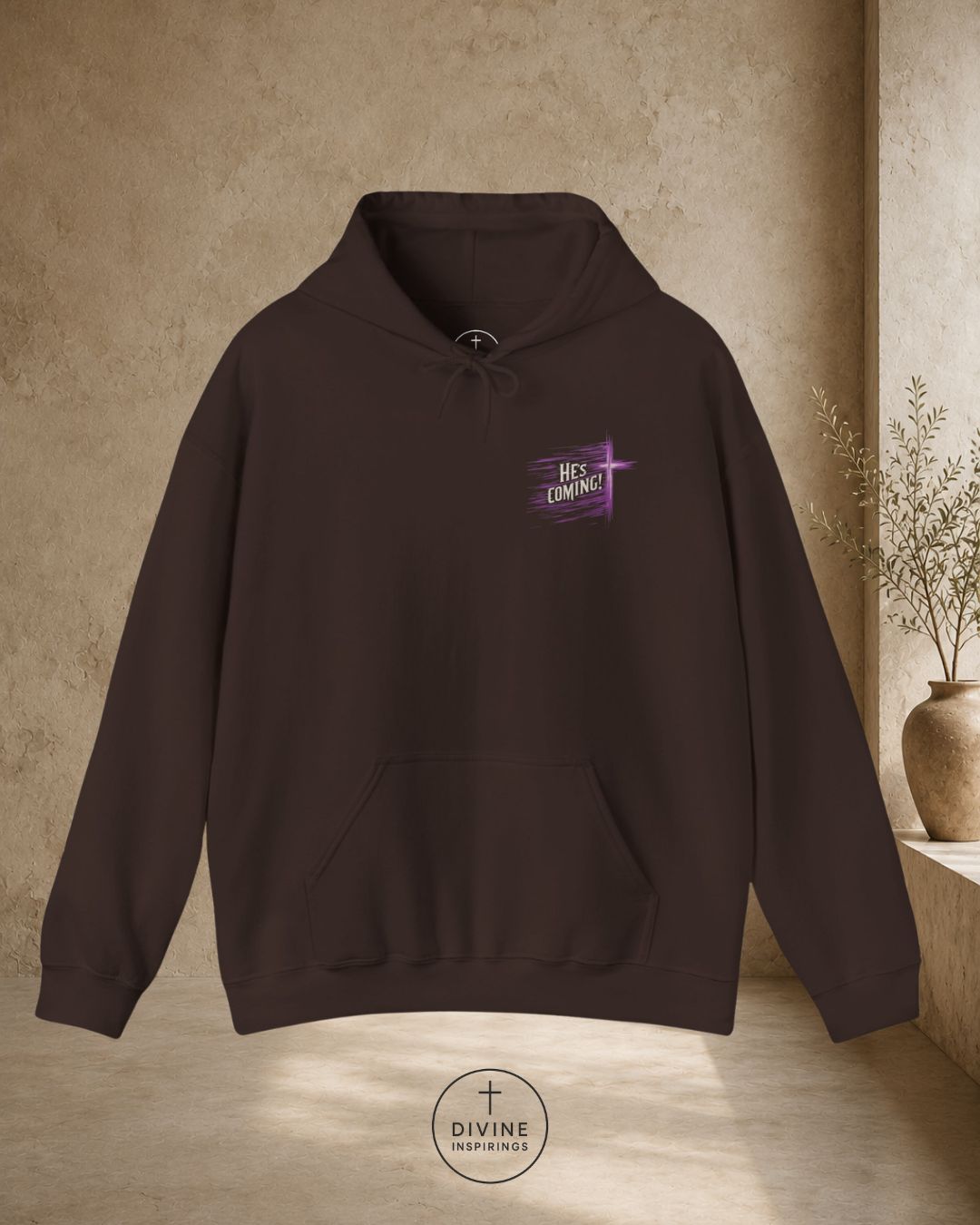 Brown hoodie with a purple graphic on a beige background