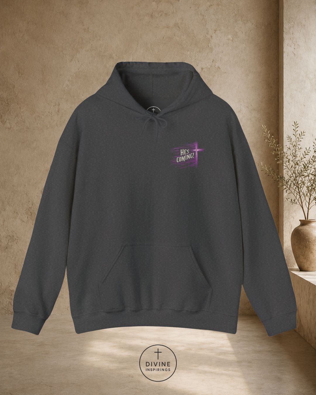 Dark gray hoodie with a purple logo on a beige background