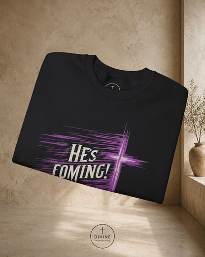 Black t-shirt with 'He's Coming!' design on a beige background