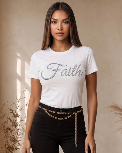 Woman wearing a white t-shirt with 'Faith' text against a beige background