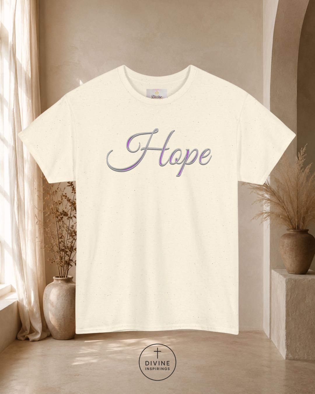 White t-shirt with 'Hope' printed on it in a room with plants and a neutral color scheme.