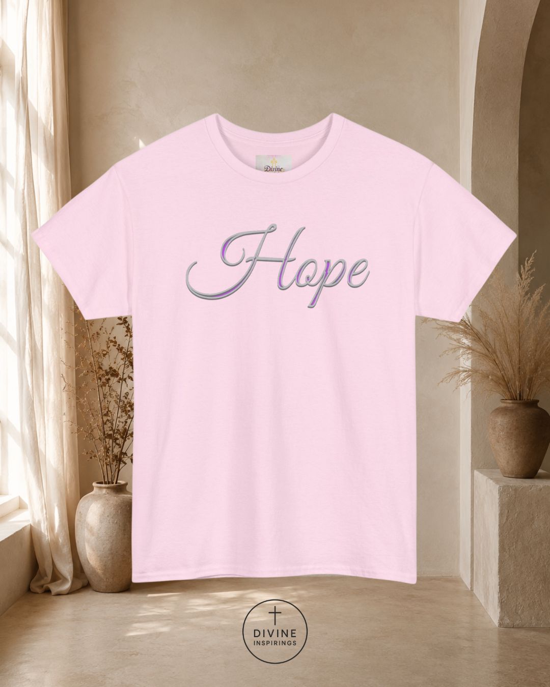 Pink t-shirt with 'Hope' text in a home setting