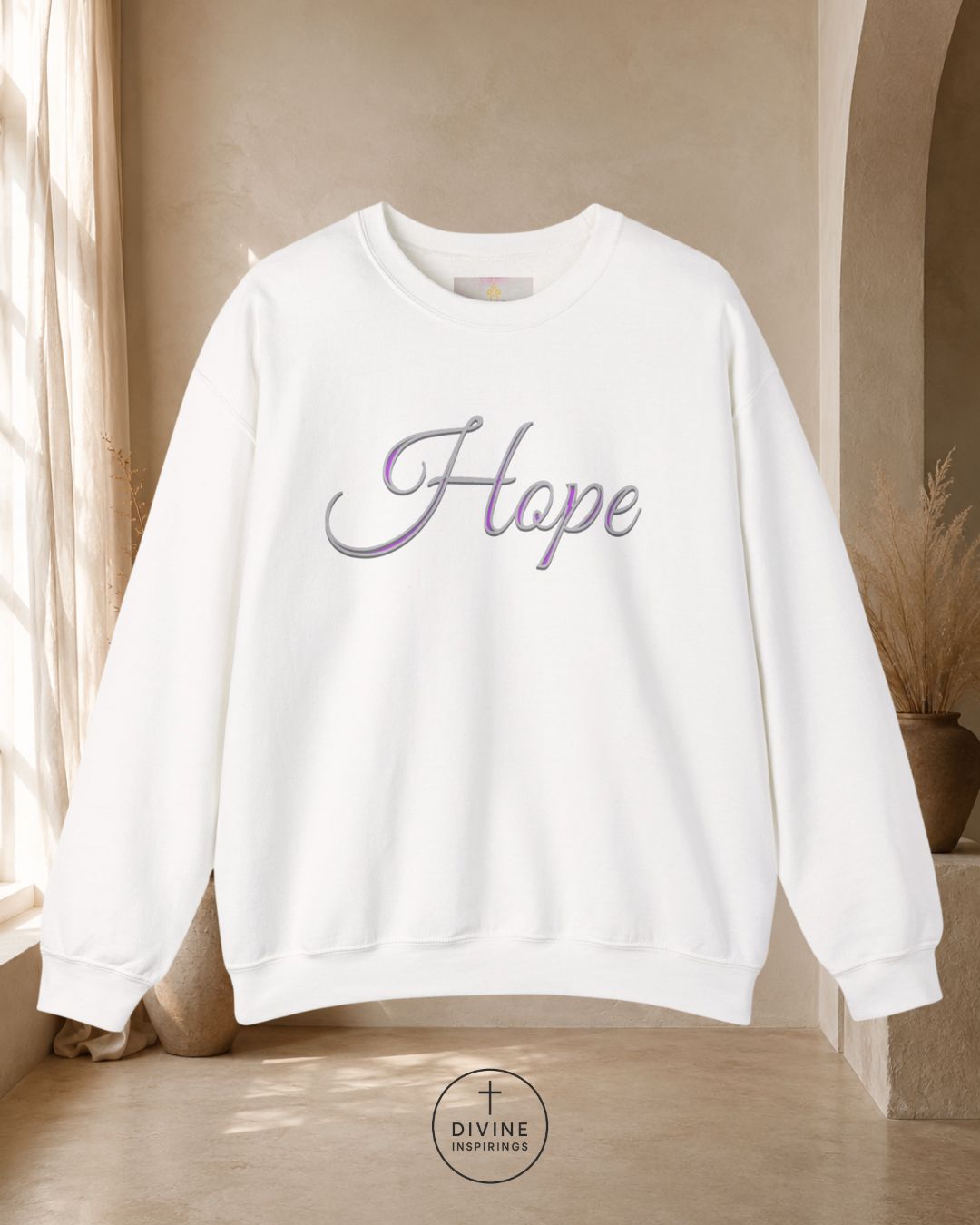 White sweatshirt with 'Hope' text in a room with beige walls and a window.
