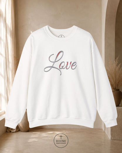 White sweatshirt with 'Love' text in a neutral indoor setting
