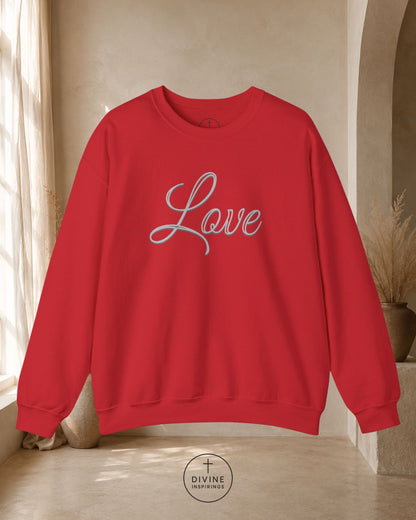 Red sweatshirt with 'Love' printed on it in a neutral setting