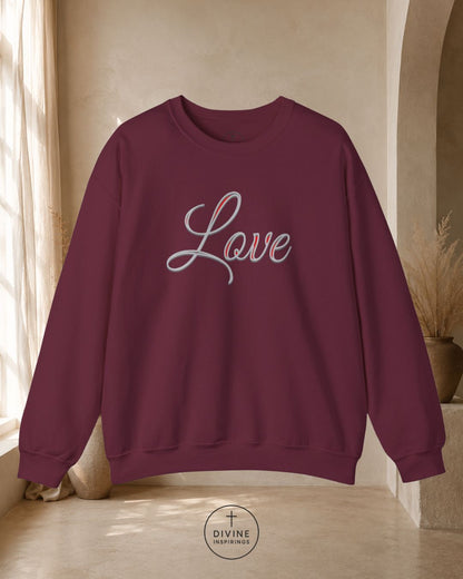 Green sweatshirt with 'Love' printed on it in a room with curtains and a plant.