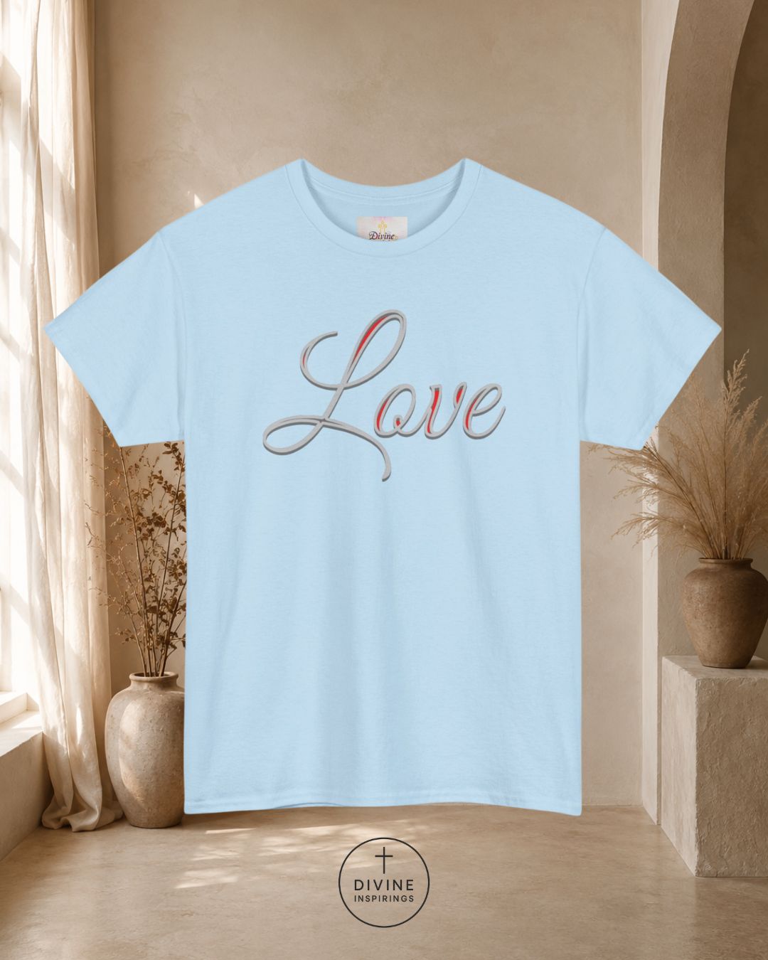 Light blue t-shirt with 'Love' text in a neutral setting
