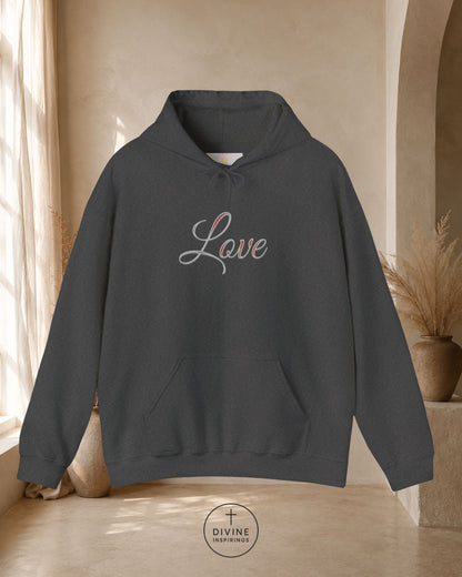 Dark gray hoodie with 'Love' text on a neutral background