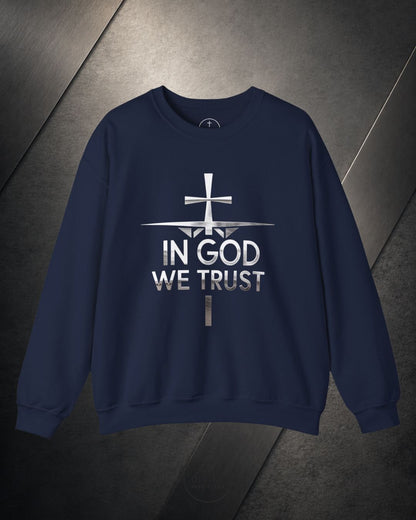 Navy blue sweatshirt with 'In God We Trust' text and cross design on a dark textured background