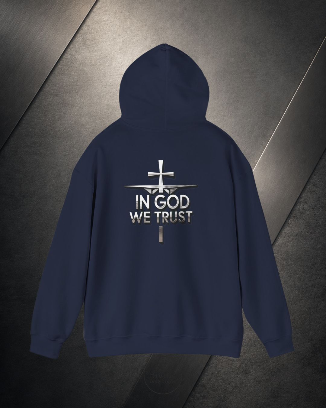 Navy blue hoodie with 'In God We Trust' text and cross design on a dark background