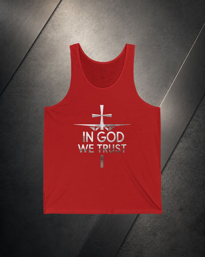 Red tank top with 'In God We Trust' text on a dark surface