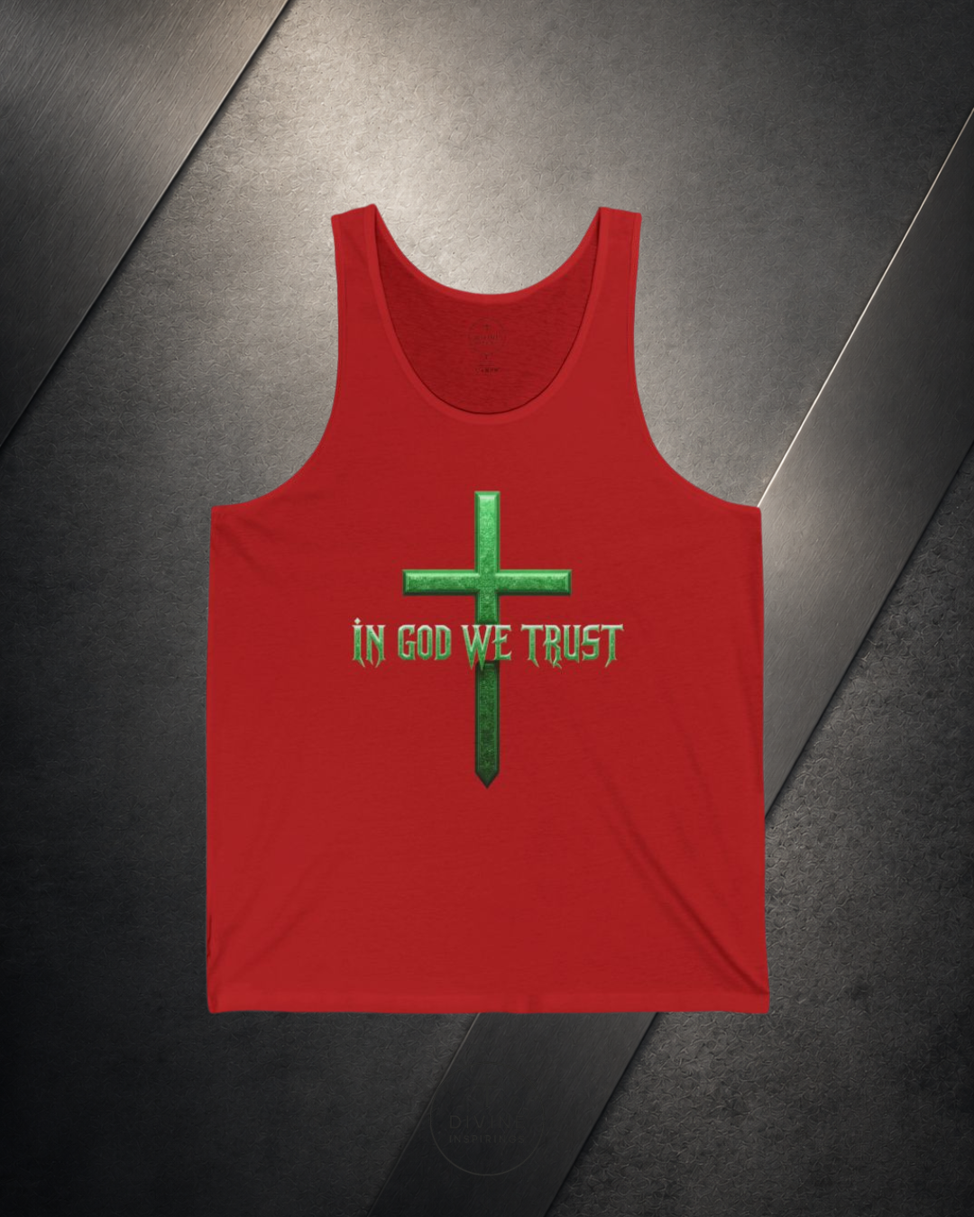 Red tank top with green cross and 'In God We Trust' text on a reflective surface