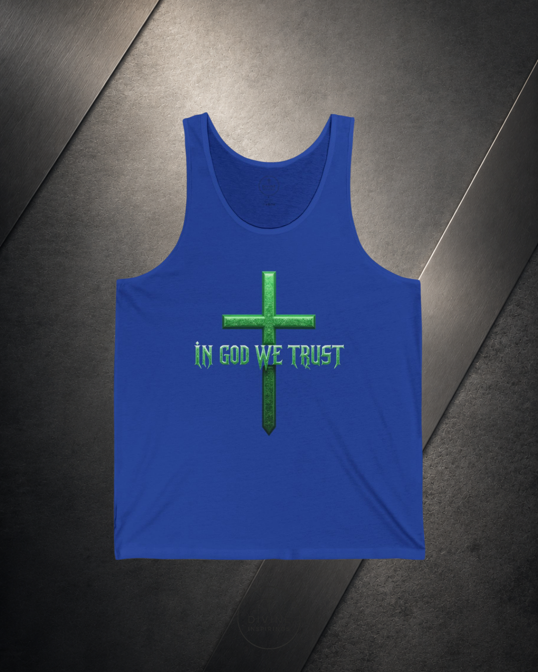 Blue tank top with green cross and 'IN GOD WE TRUST' text on a dark surface