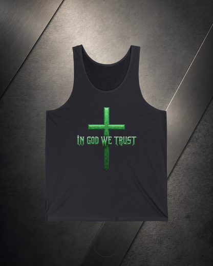 Black tank top with green cross and 'IN GOD WE TRUST' text on a dark surface