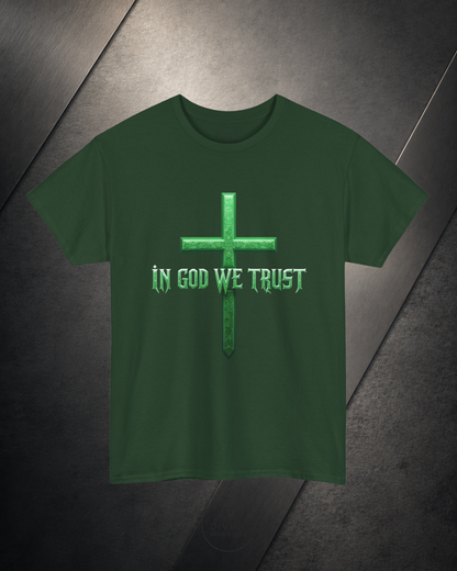Green t-shirt with a cross and 'In God We Trust' text on a dark textured background