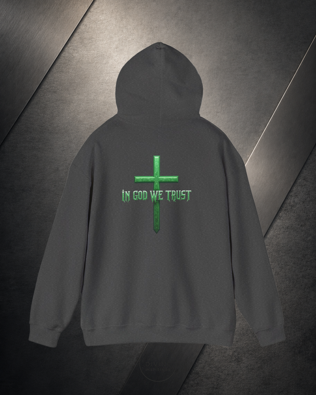 Gray hoodie with a green cross and 'IN GOD WE TRUST' text on the back against a dark background