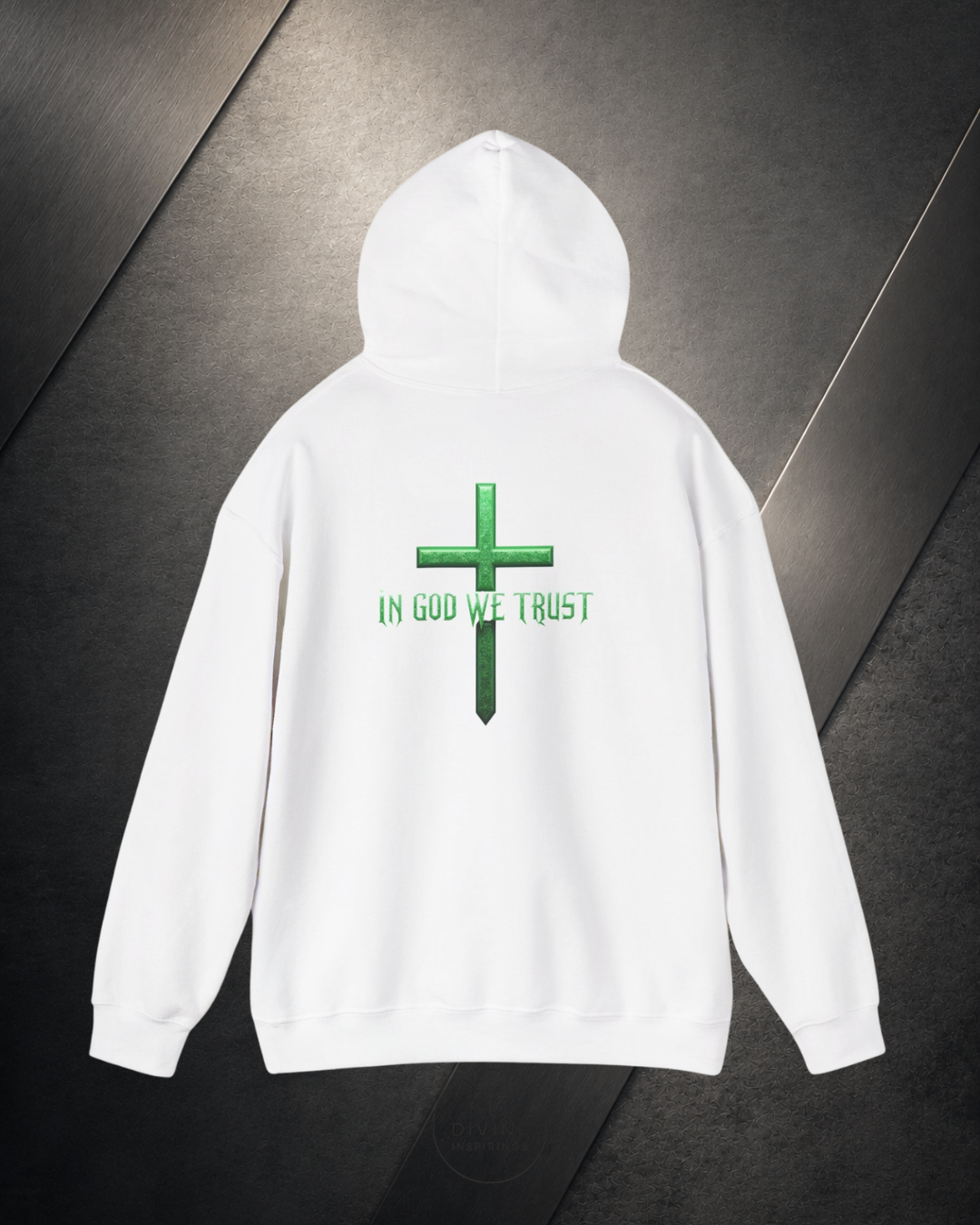 White hoodie with green cross and 'IN GOD WE TRUST' text on a dark background