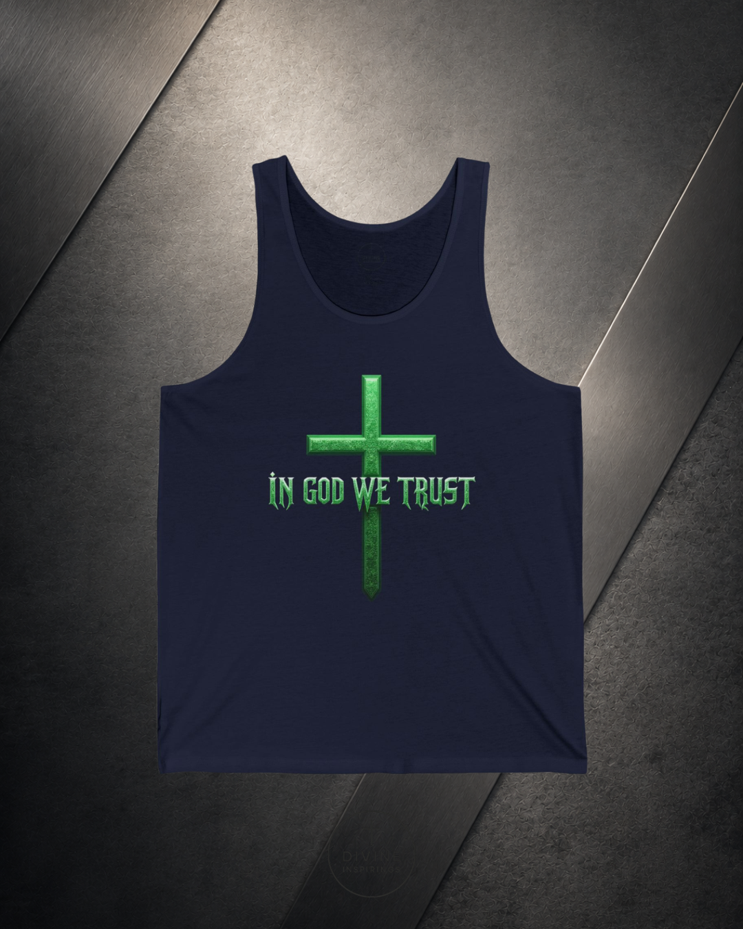 Navy tank top with green cross and 'IN GOD WE TRUST' text on a dark surface