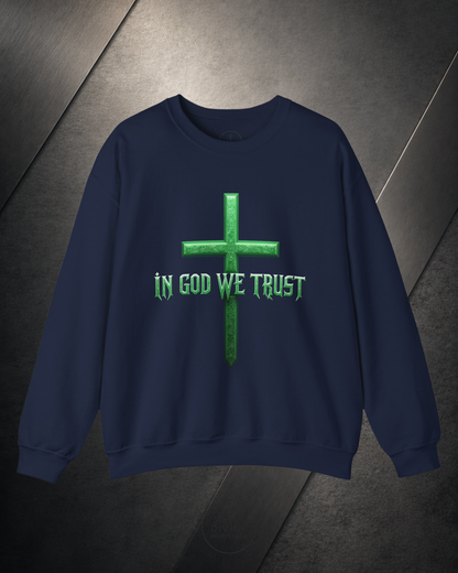 Navy blue sweatshirt with green cross and 'In God We Trust' text on a dark background
