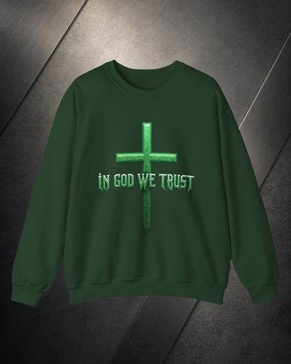 Green sweatshirt with 'In God We Trust' text and cross design on a dark background