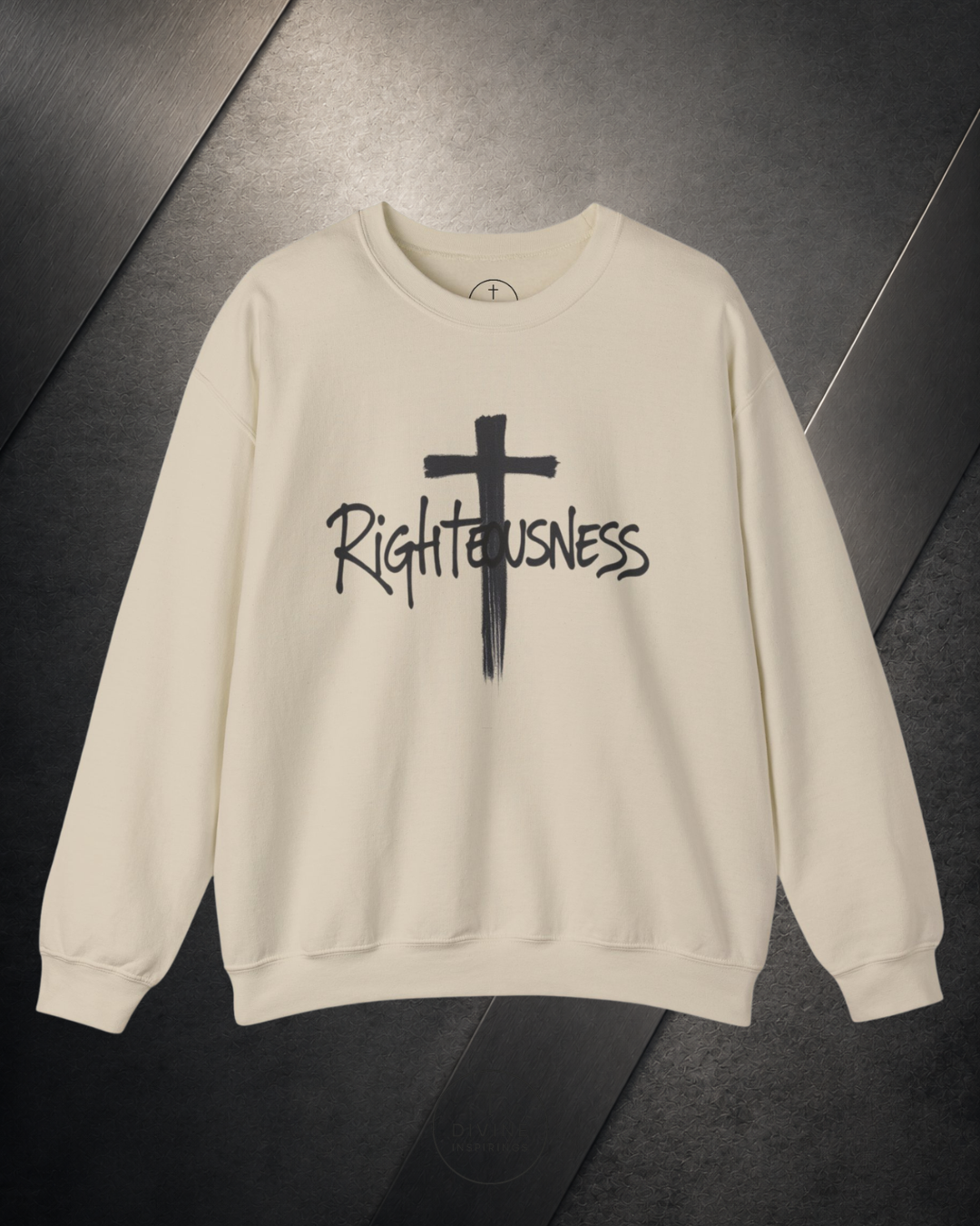 Beige sweatshirt with a black cross and 'Righteousness' text on a dark surface