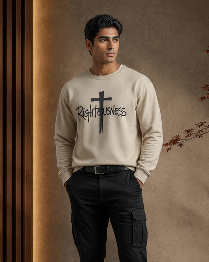 Man wearing a beige sweatshirt with 'Righteousness' text and cross graphic against a brown background