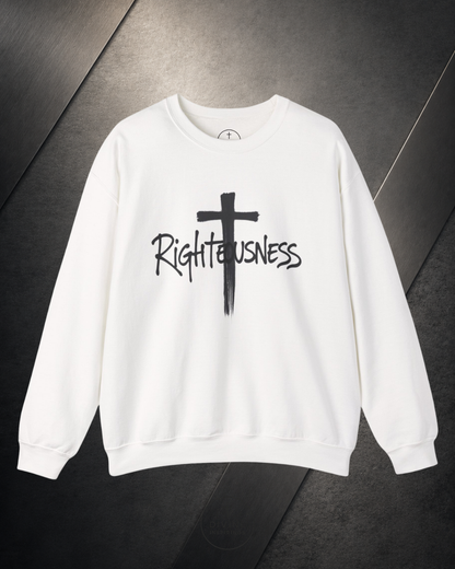 Beige sweatshirt with a black cross and 'Righteousness' text on a dark surface