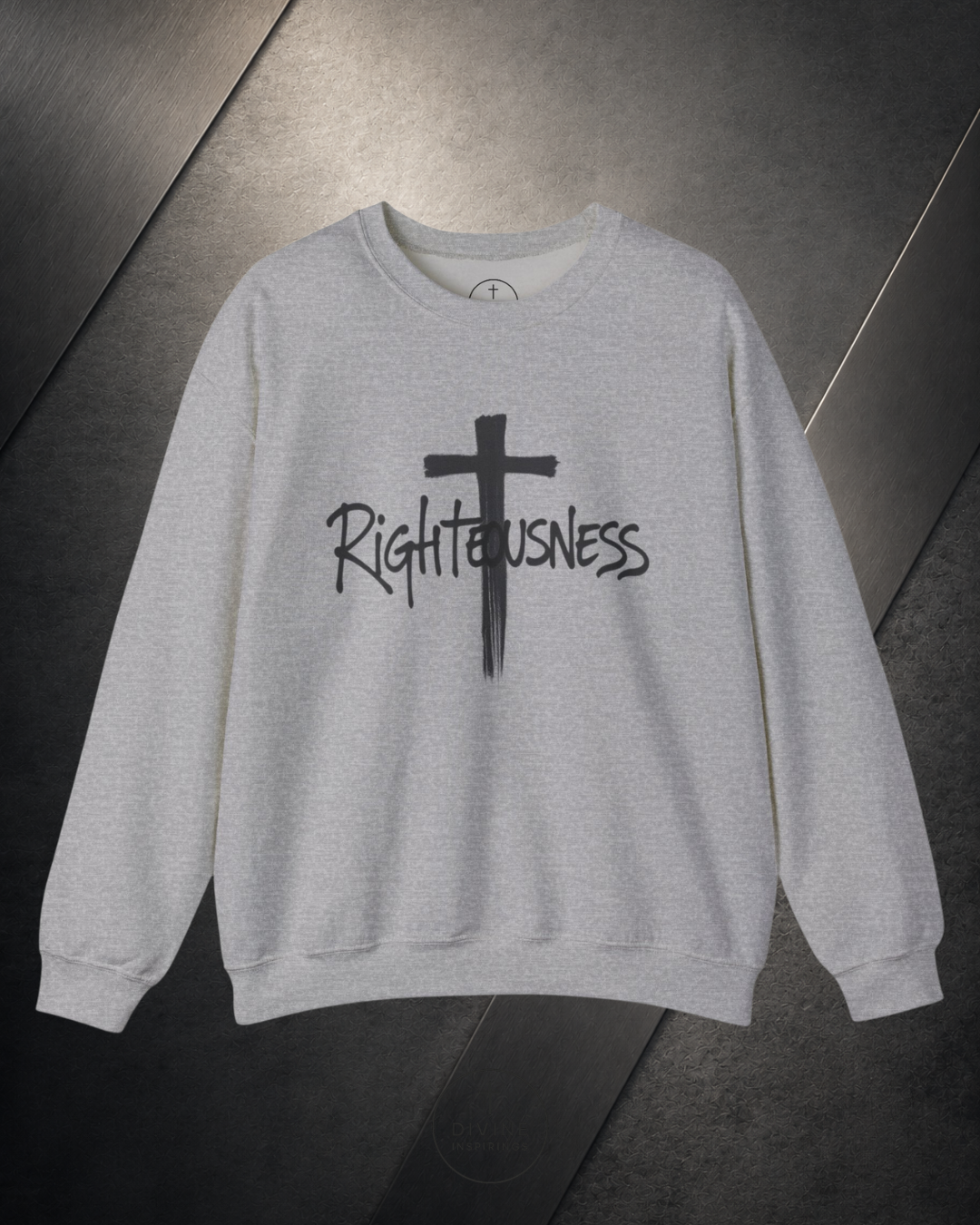 Gray sweatshirt with a black cross and 'Righteousness' text on a dark surface